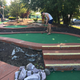 Trying to hit it into one hole to get it to the next; I failed.